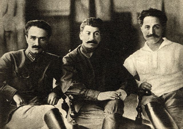 1280px-Ordzhonikidze,_Stalin_and_Mikoyan,_1925